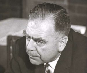 Black and white photo of man in suit